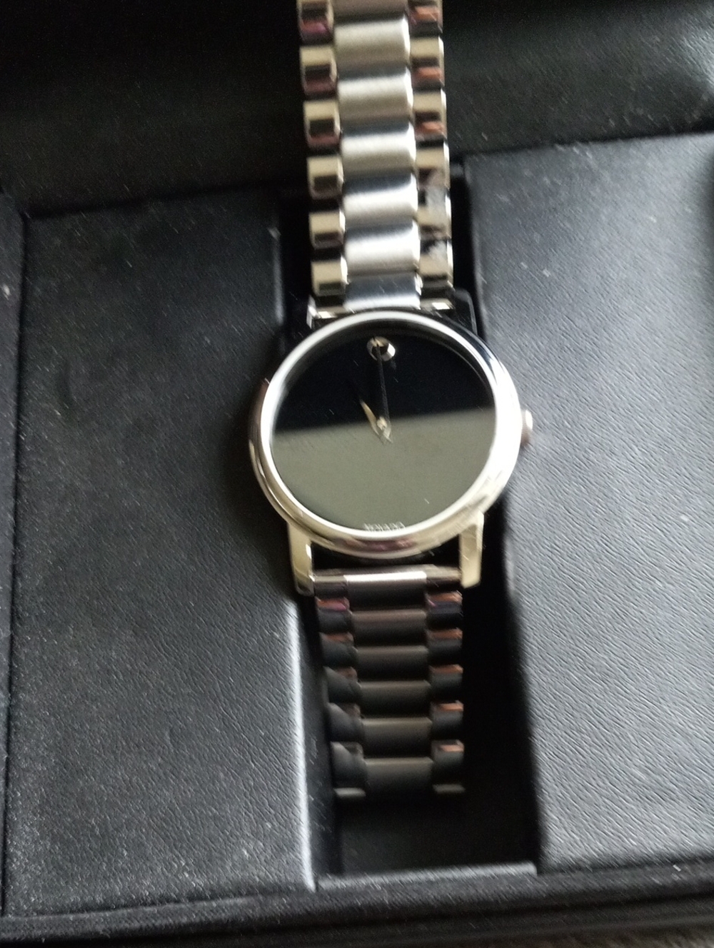 Movado Black Dial with Silver Stainless Steel Bracelet Watch